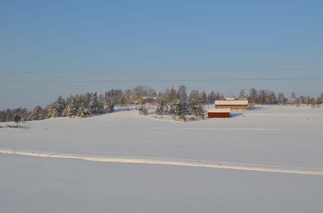 Koitsanlahden hovin ympäristöä 6-tieltä kaakon suunnasta kuvattuna.&nbsp;(Miikka Kurri&nbsp;3.2.2012)